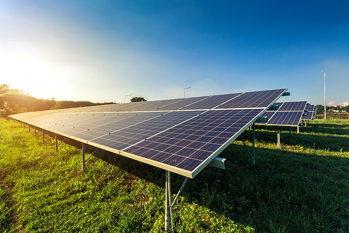 photovoltaic solar power panel on sky background